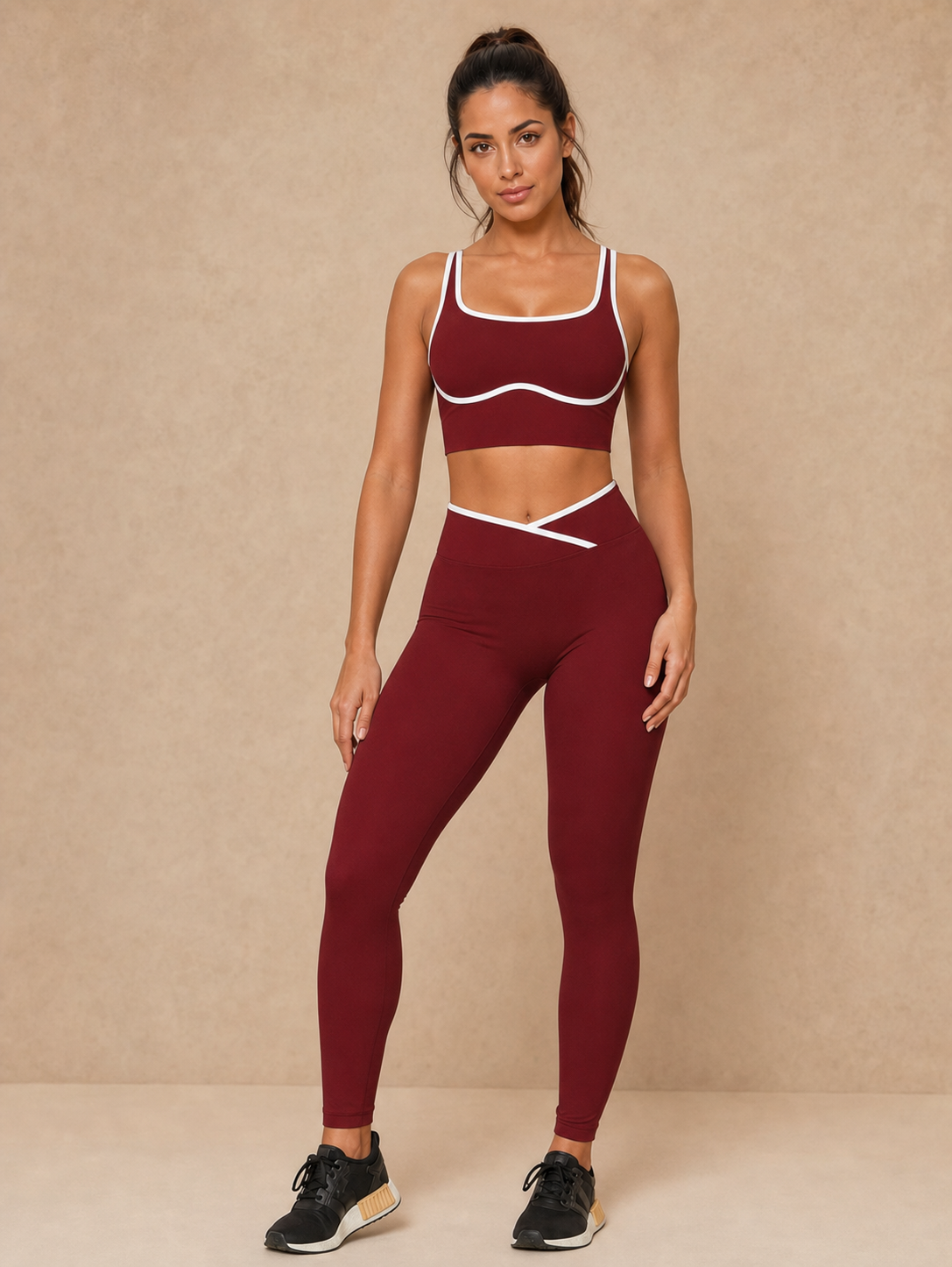 Foto de catalogo com modelo padrao em conjunto fitness vinho com detalhes brancos
